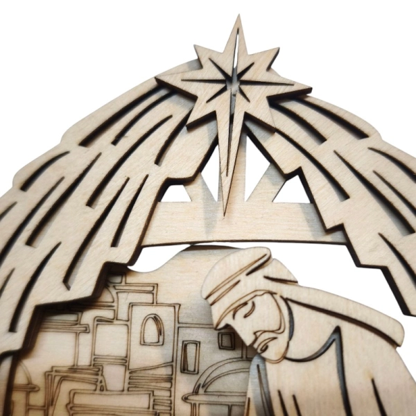 Detal szopki 3D: postać Józefa z lampionem oraz Gwiazda Betlejemska na dachu stajenki.