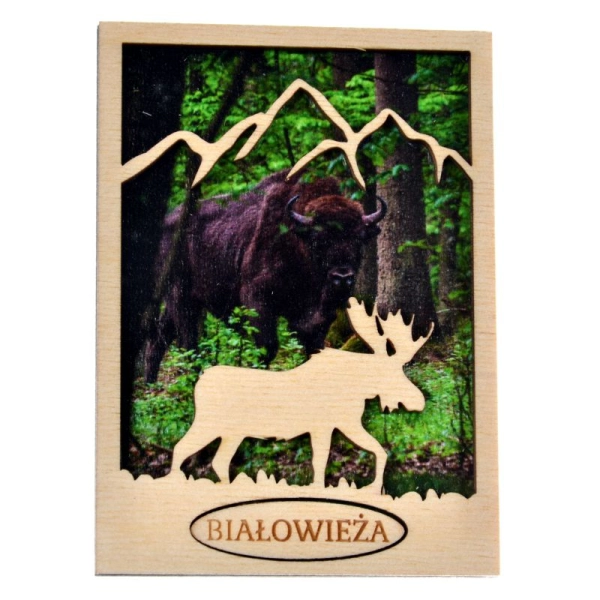 drewniany magnes łoś z konturem gór w tle znajduje się widoczek lasu i żubra