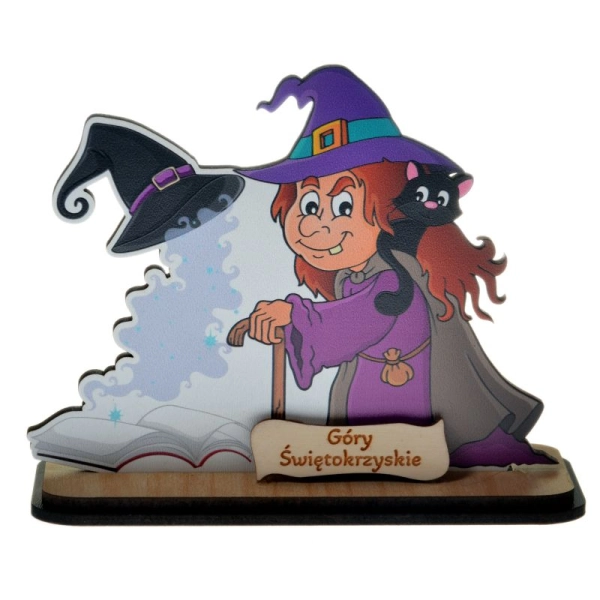 drewniana czarownica z magiczną księgą