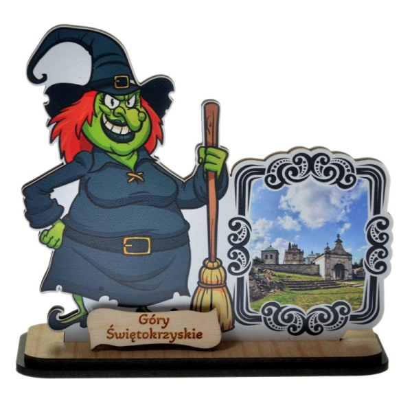 drewniana czarownica z miotłą