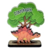 Dinozaur z ozdobnym drzewkiem