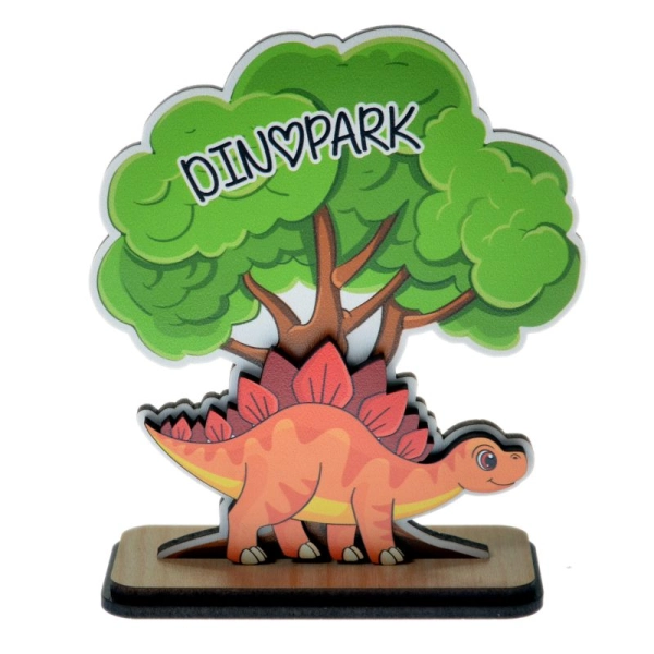 Dinozaur z ozdobnym drzewkiem