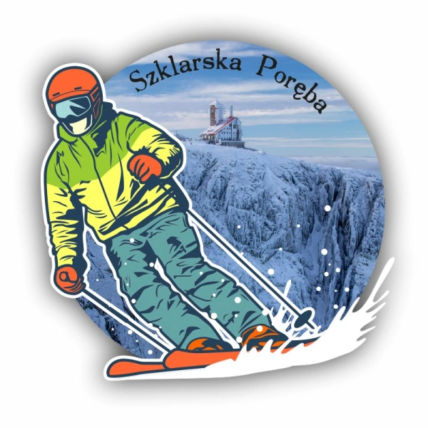 Magnes na lodówkę w kształcie narciarza wpisanego w koło z widokiem. 