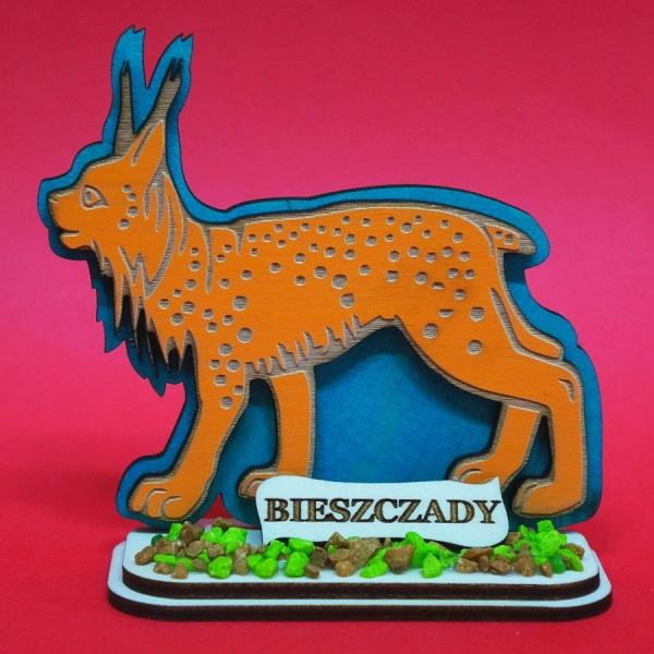 Pomarańczowy RYŚ na podstawce