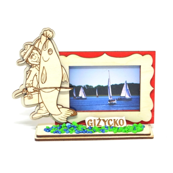 Wędkarz z dużym widoczkiem na podstawce