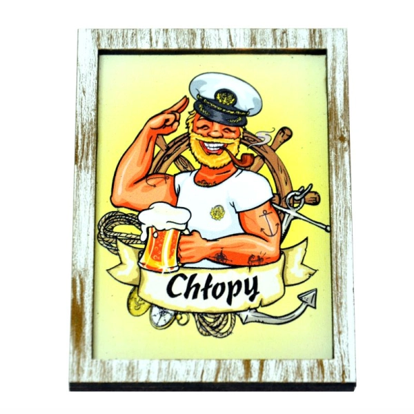 Magnes z marynarzem, w tle jest koło sterowe a poniżej wstęga na której jest napis miejscowości